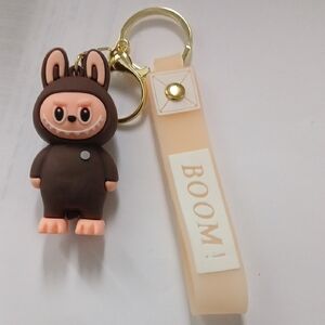 Brown Character Keychain with Cream Strap